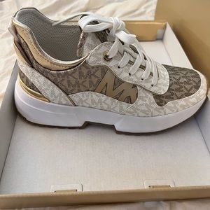 Michael Kors Muse Trainer size 6 women’s sneaker in gold white and multi